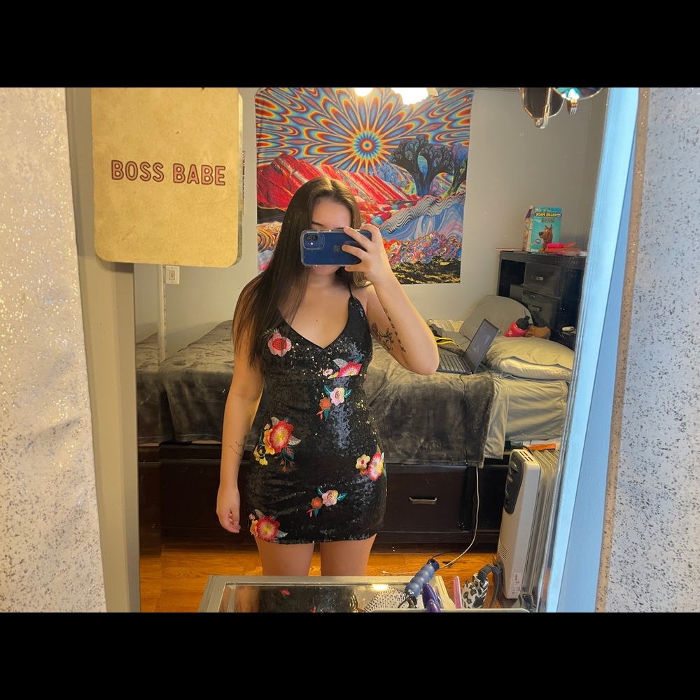 A black sequin mini cocktail dress w flowers